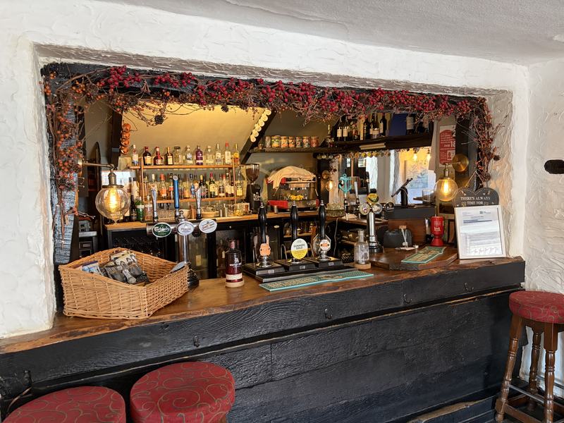 The bar, dressed with hops and berries